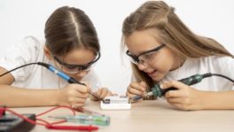 girls-with-safety-glasses-doing-science-experiments-together-1134x638